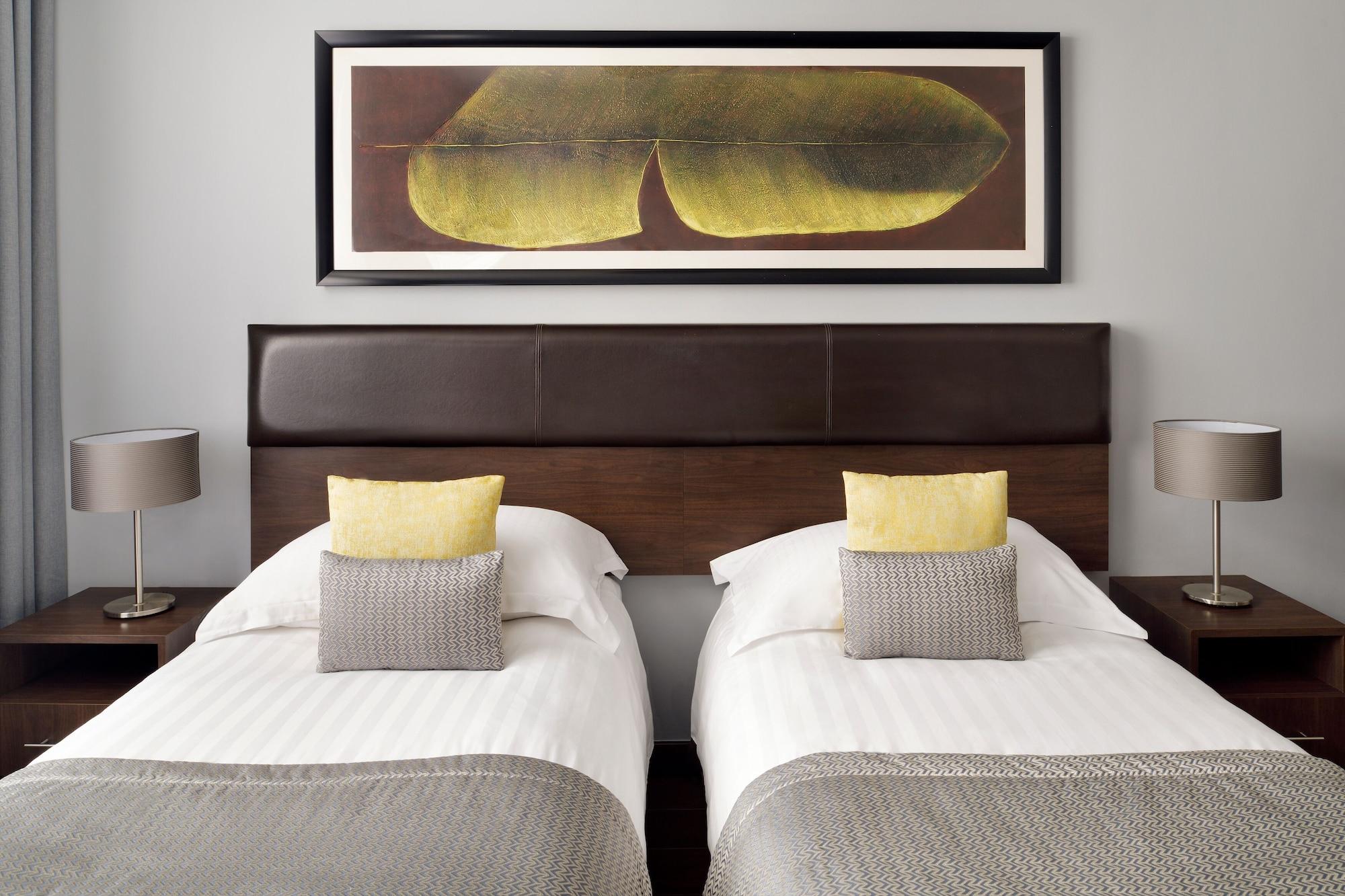 Moevenpick Hotel Apartments Al Mamzar Дубай Екстер'єр фото Artwork by David Ascoli