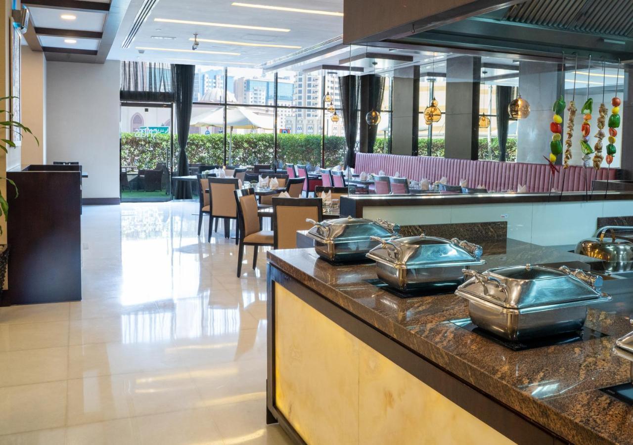 Moevenpick Hotel Apartments Al Mamzar Дубай Екстер'єр фото The restaurant